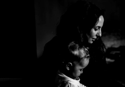 Grayscale Photography Of Mother And Child photo