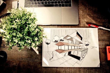 Brown House Illustration On Brown Wooden Table photo