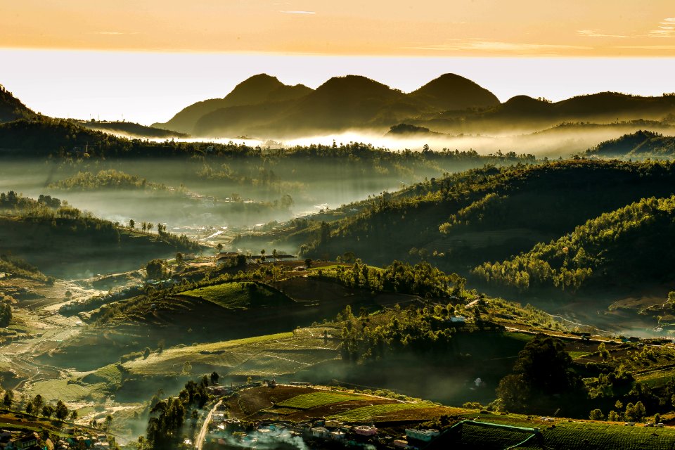 Green Mountain Under White Sky