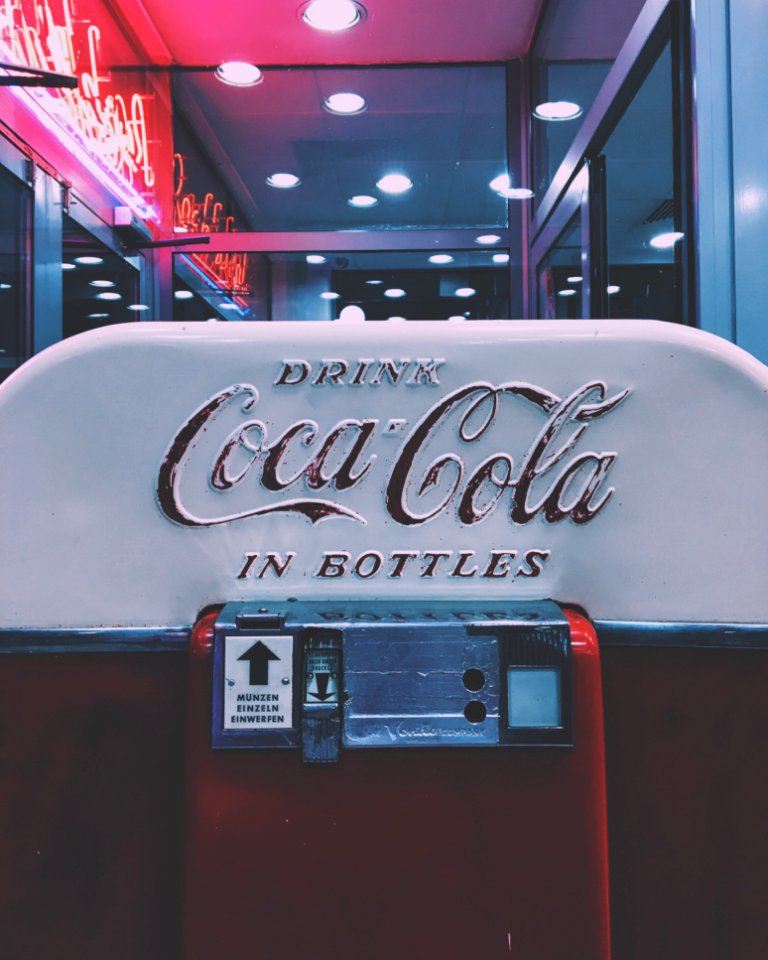 Red And White Drink Coca-cola In Bottle Dispenser