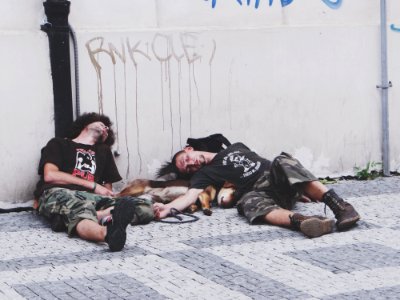 Photo Of Men Sleeping On The Street photo