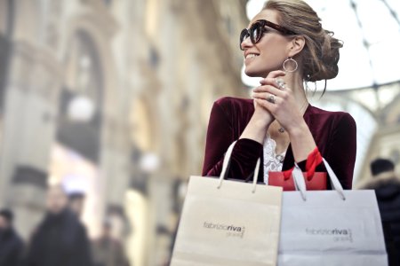 Photo Of A Woman Holding Shopping Bags photo