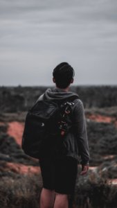 Photo Of A Man Wearing Black Backpack photo