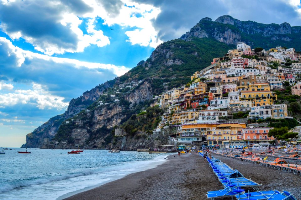Photography Of Beach Near Mountain