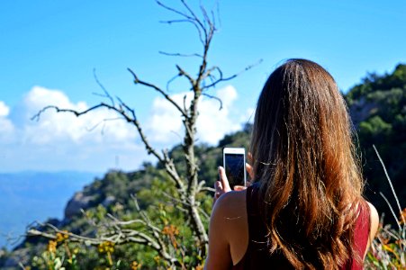 Photo Of Woman Taking Photo photo