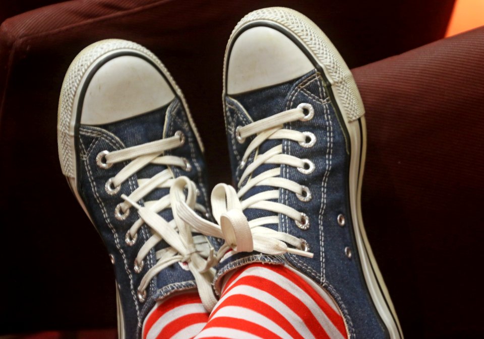 Person Wearing A Pair Of Blue Low-top Sneakers