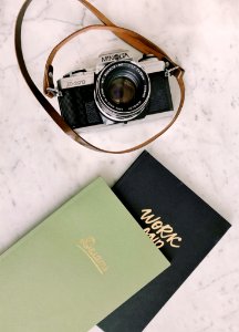 Black And Gray Minolta Milc Camera