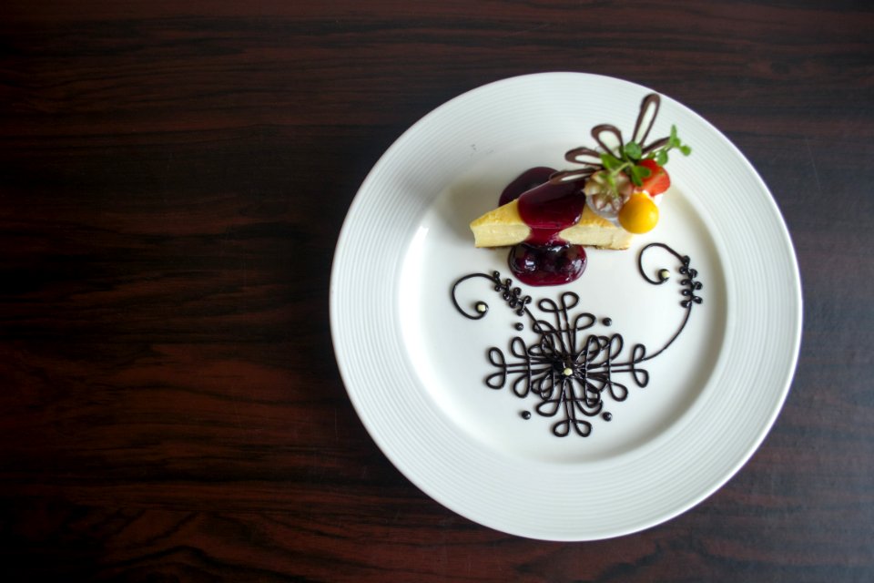 Pie With Red Syrup Gourmet On White Plate
