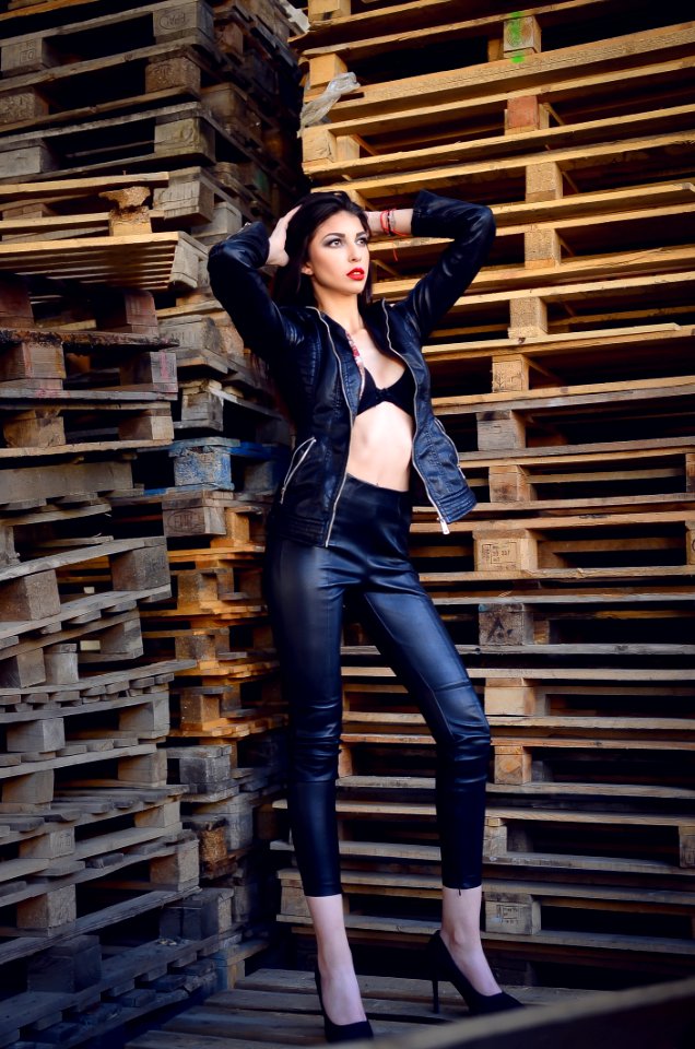 Photo Of A Woman Wearing Leather Jacket And Pants