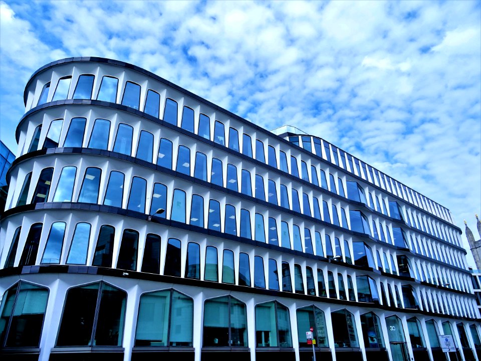 White Concrete High-rise Building At Daytime photo