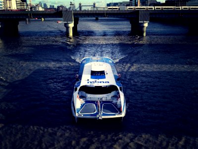 Photography Of White And Blue Boat photo