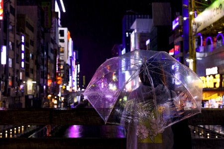 Photo Of A Person Holding An Umbrella photo