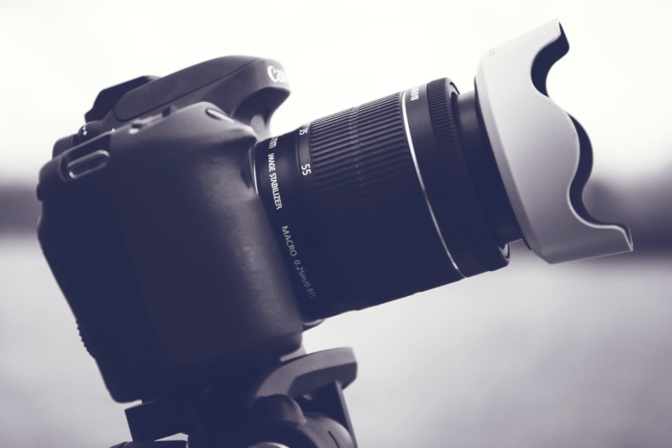 Black And Gray Dslr Camera With Lens