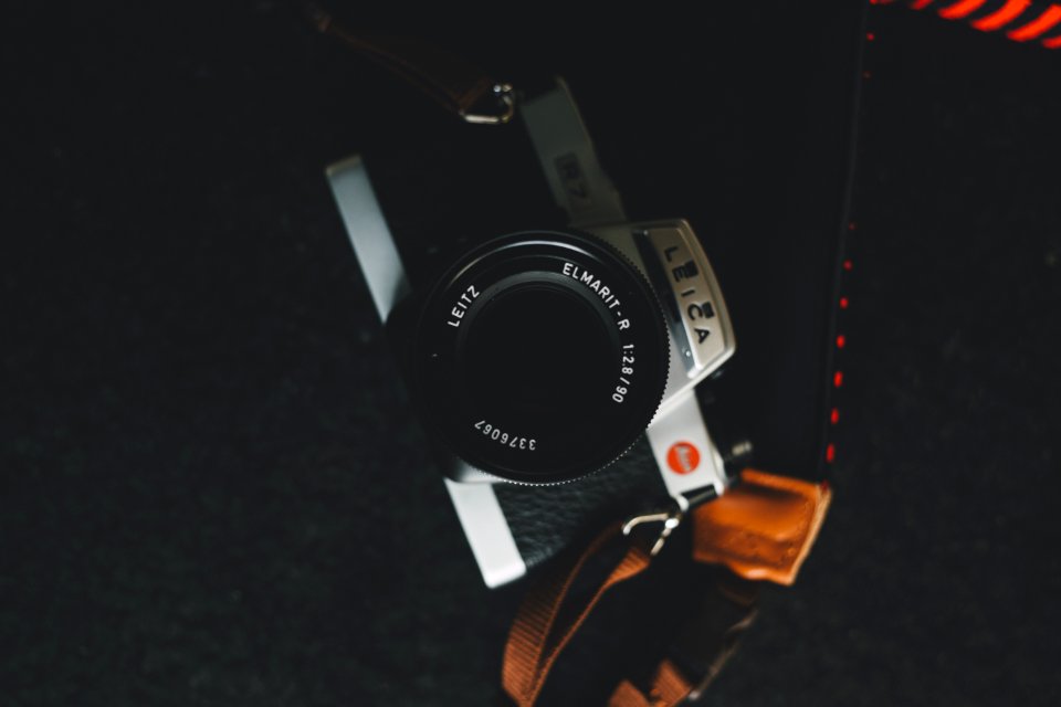Gray And Black Leica Dslr Camera On Black Surface