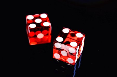 Closeup Photo Of Two Red Dices Showing 4 And 5 photo