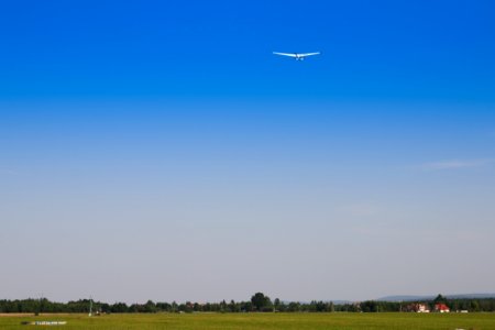 Sky Daytime Airplane Grassland photo