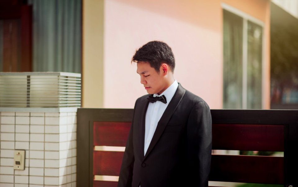 Photo Of The Groom Wearing His Tuxedo