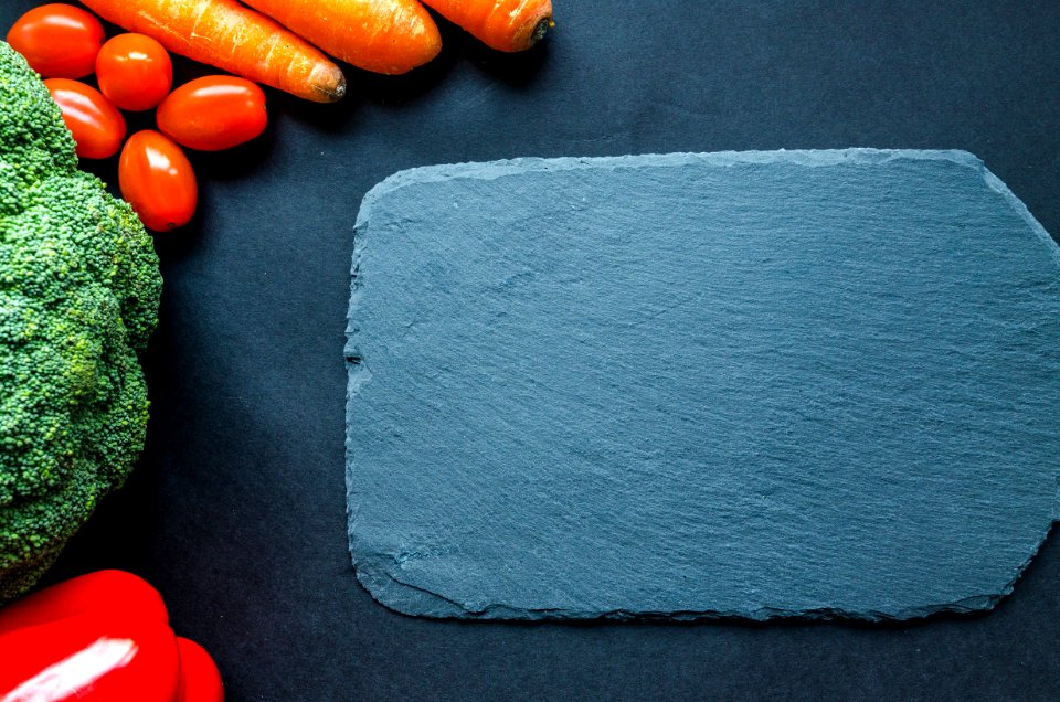 Gray Chapping Board Beside Vegetables