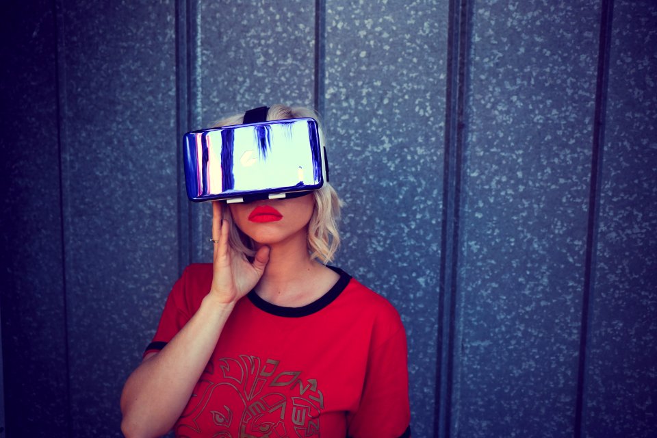 Photography Of A Woman Wearing Virtual Reality Headset