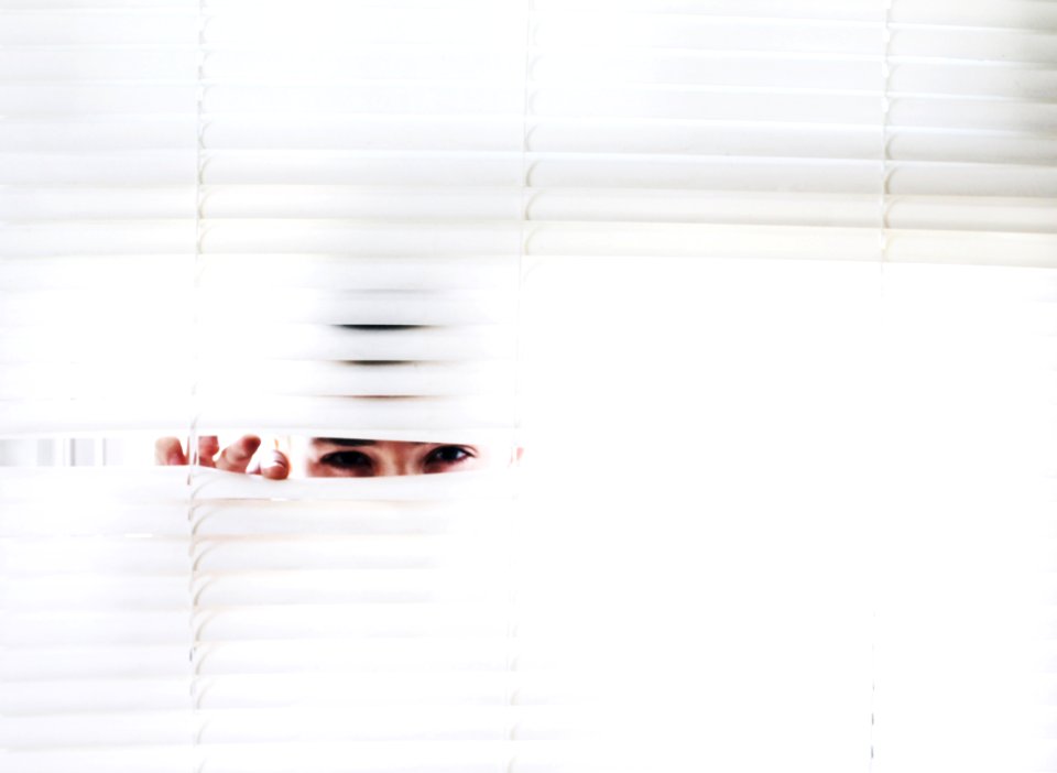 Photography Of Person Peeking