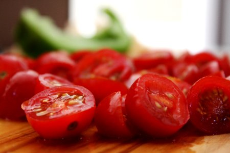 Close-Up Photography Of Slices Of Cherry Tomatoes photo