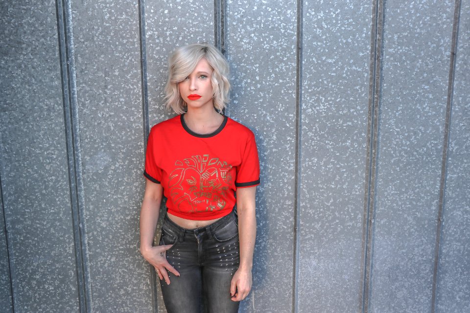 Woman In Red Shirt And Black Pants