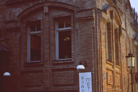 Brown Stone Brick Building Near Black Lamp Post photo