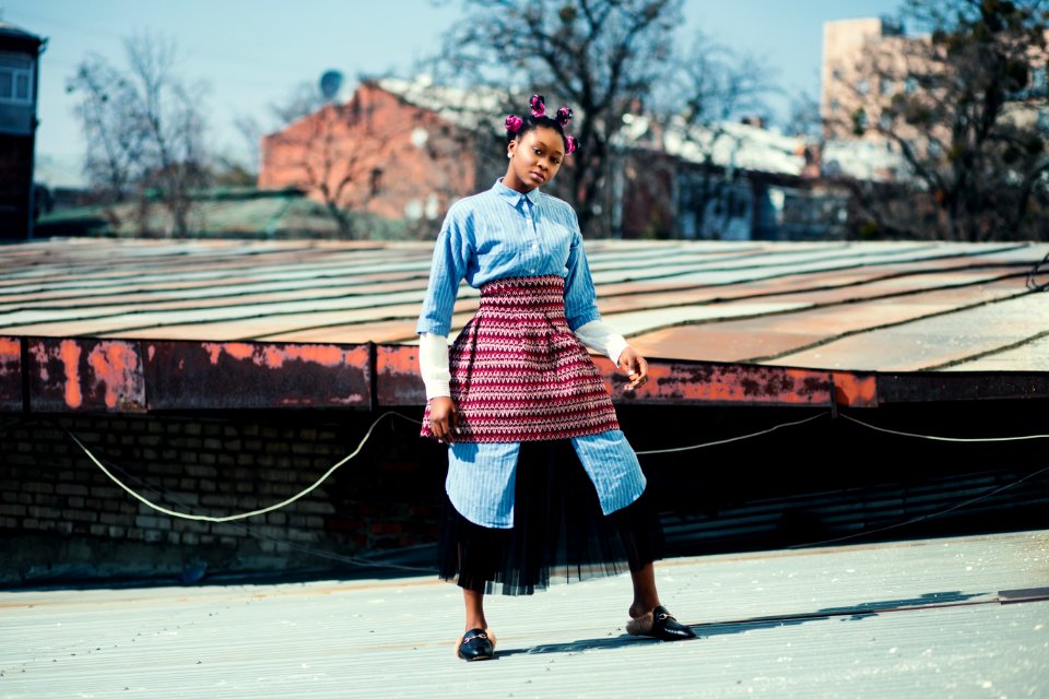 Woman Wearing Blue And Red Long-sleeved Dress On Road