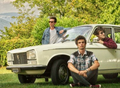 Shallow Focus Photography Of Three Men With White Car Surrounded Of Trees