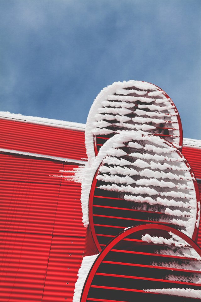 White And Red Window Under Gray Sky photo