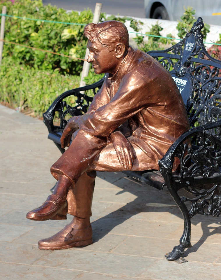 Bollywood actor sitting