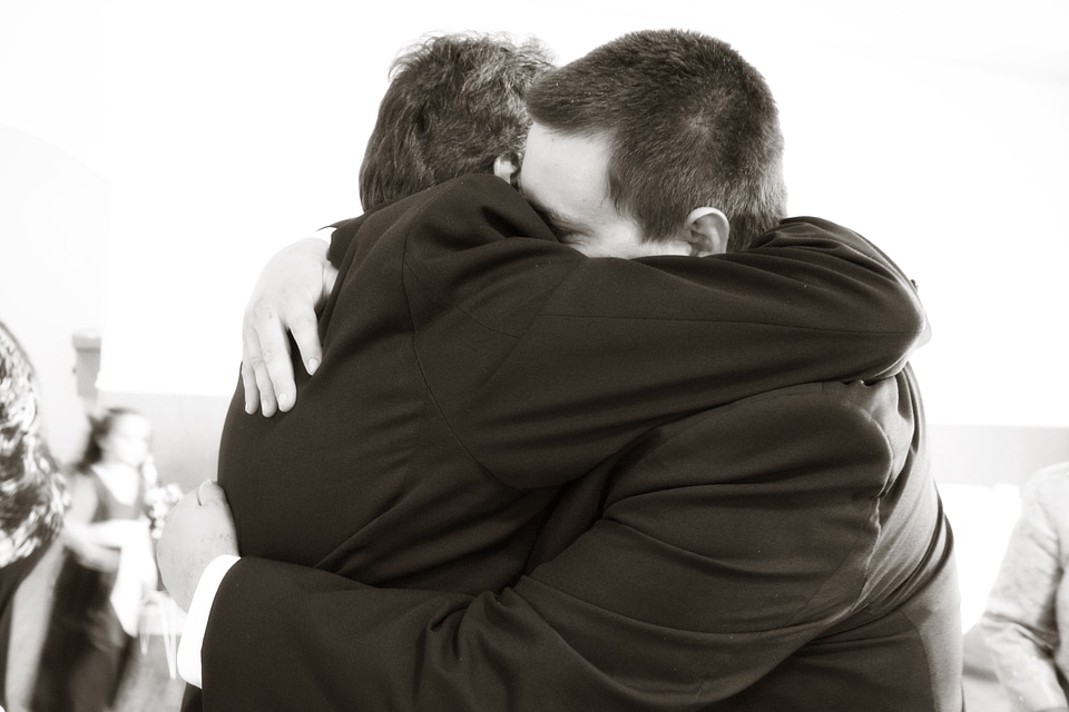 Son family embracing
