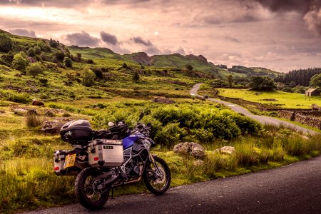 Land Vehicle Motorcycle Sky Mountainous Landforms photo