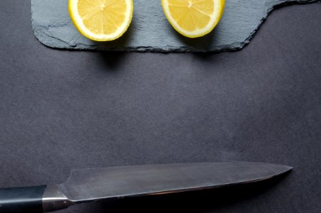 Sliced Lemon And Gray Knife photo