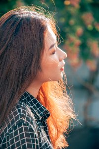 Shallow Focus Photography Of Woman Wearing Black And White Striped Top photo