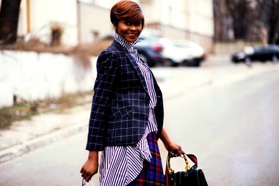 Photo Of Woman In Black And Gray Blazer Holding Bag