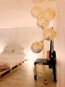 Balloons Near White Bedspread Set photo