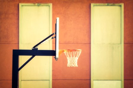 Shallow Focus Photography Of Black Metal Outdoor Basketball Hoop photo
