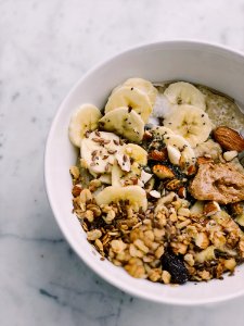 Cereal With Banana On White Bowl photo