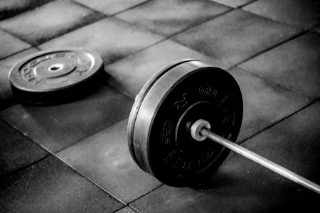 Grayscale Photo Of Black Adjustable Dumbbell photo