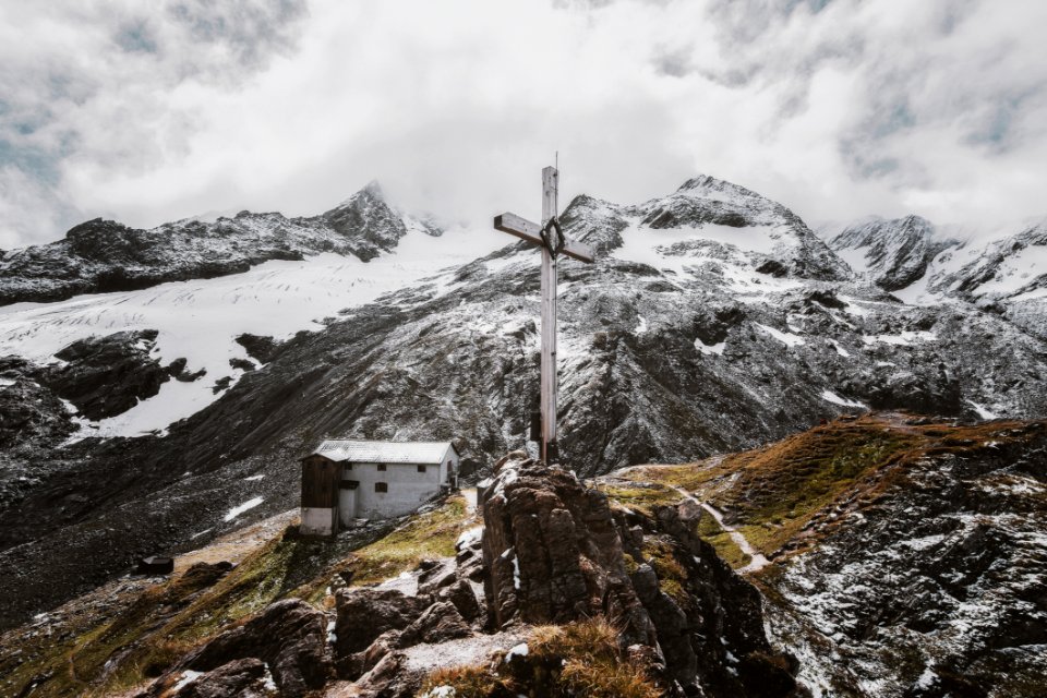 Landscape Photo Of White Cross On Mountain
