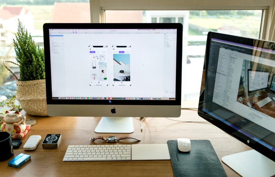 Apple Imac On Brown Wooden Desk