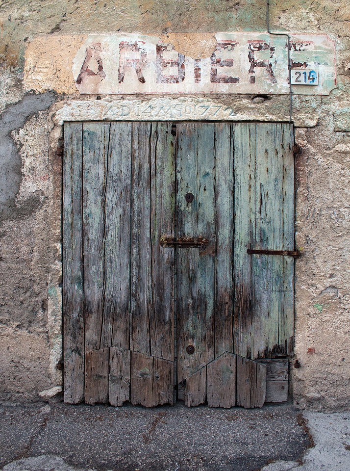 Old barber's shop doorway dilapidated