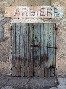 Old barber's shop doorway dilapidated