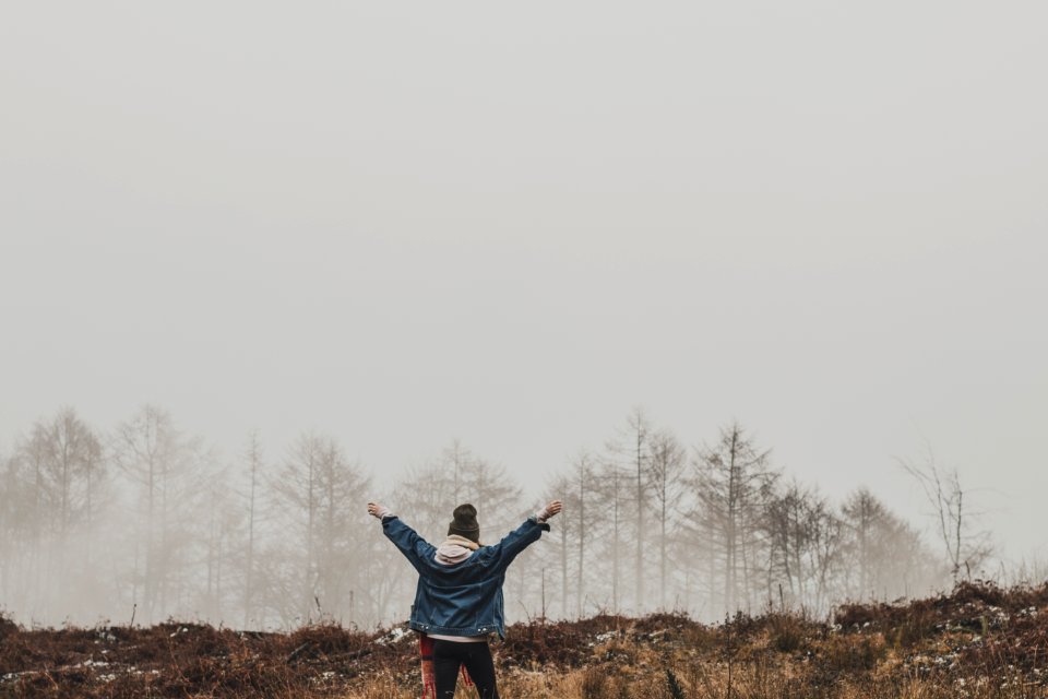 Person In Blue Jacket Standing