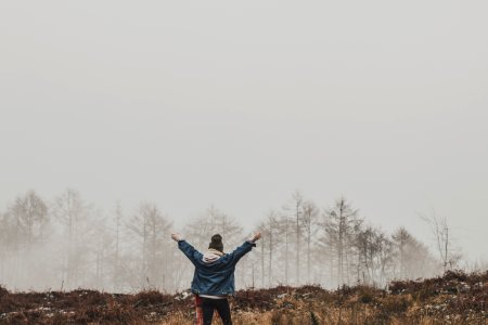 Person In Blue Jacket Standing photo