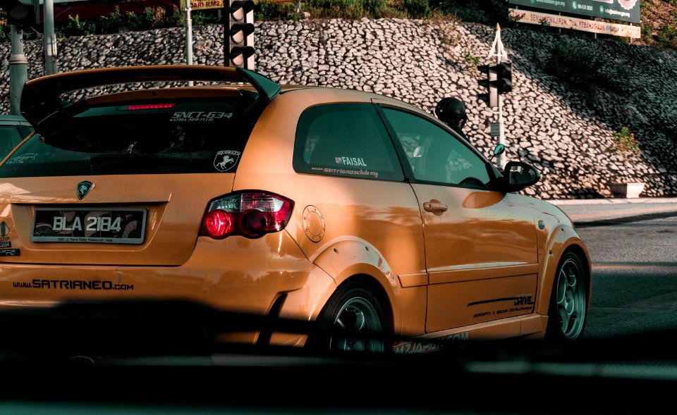 Photo Of Orange 3-door Hatchback