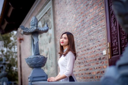 Woman Wearing White Blouse Looking At Sky photo