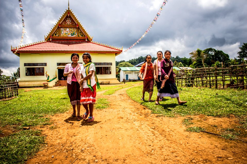Five Women Walking On Green Grasses