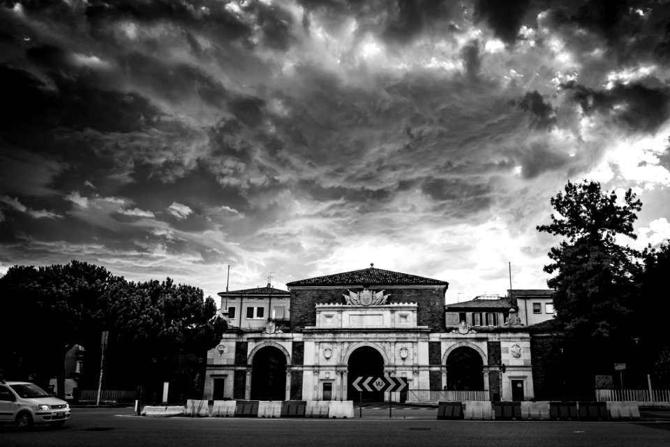 Grayscale Photo Of Concrete Mansion photo